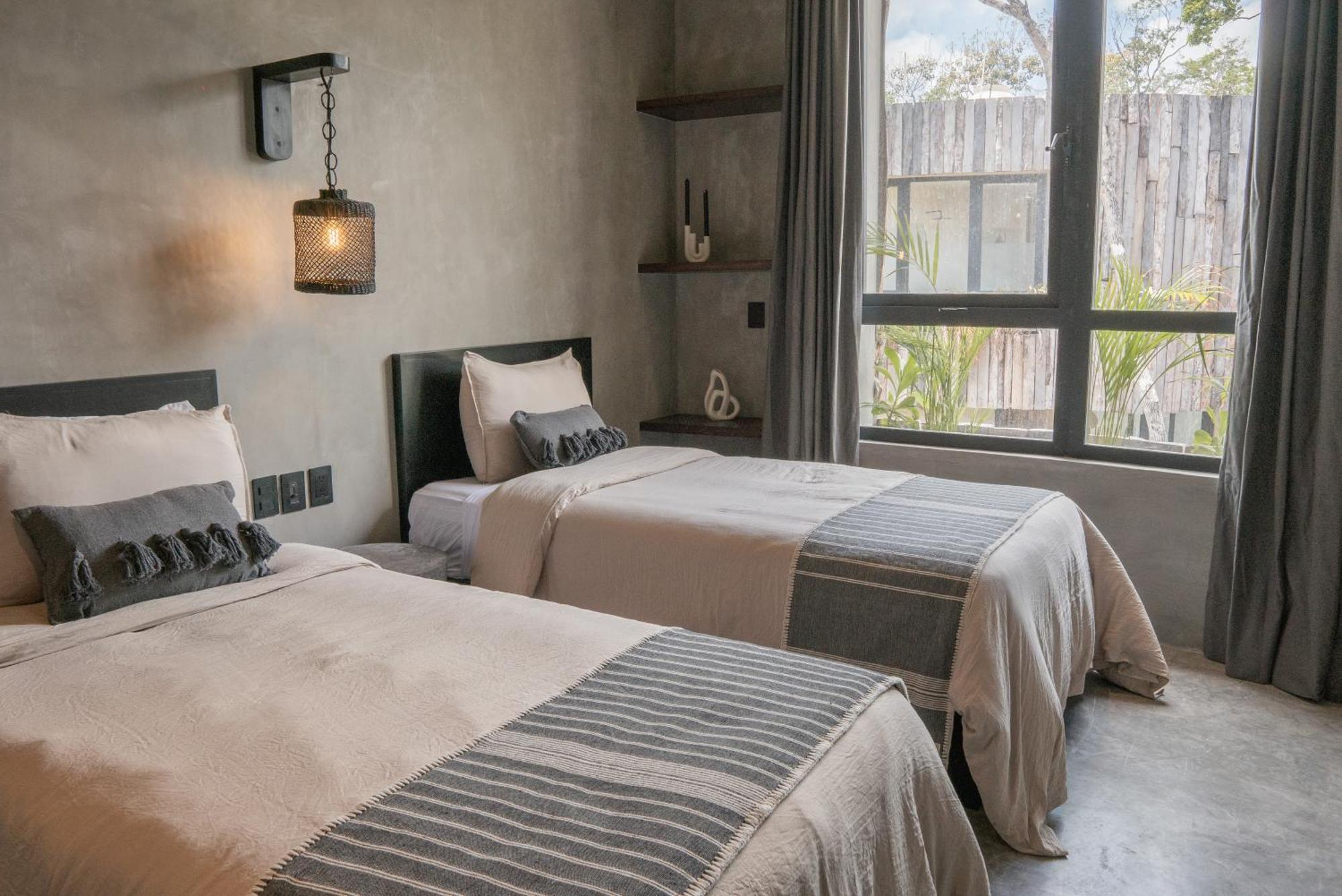 Esencia Villas 툴룸 객실 사진